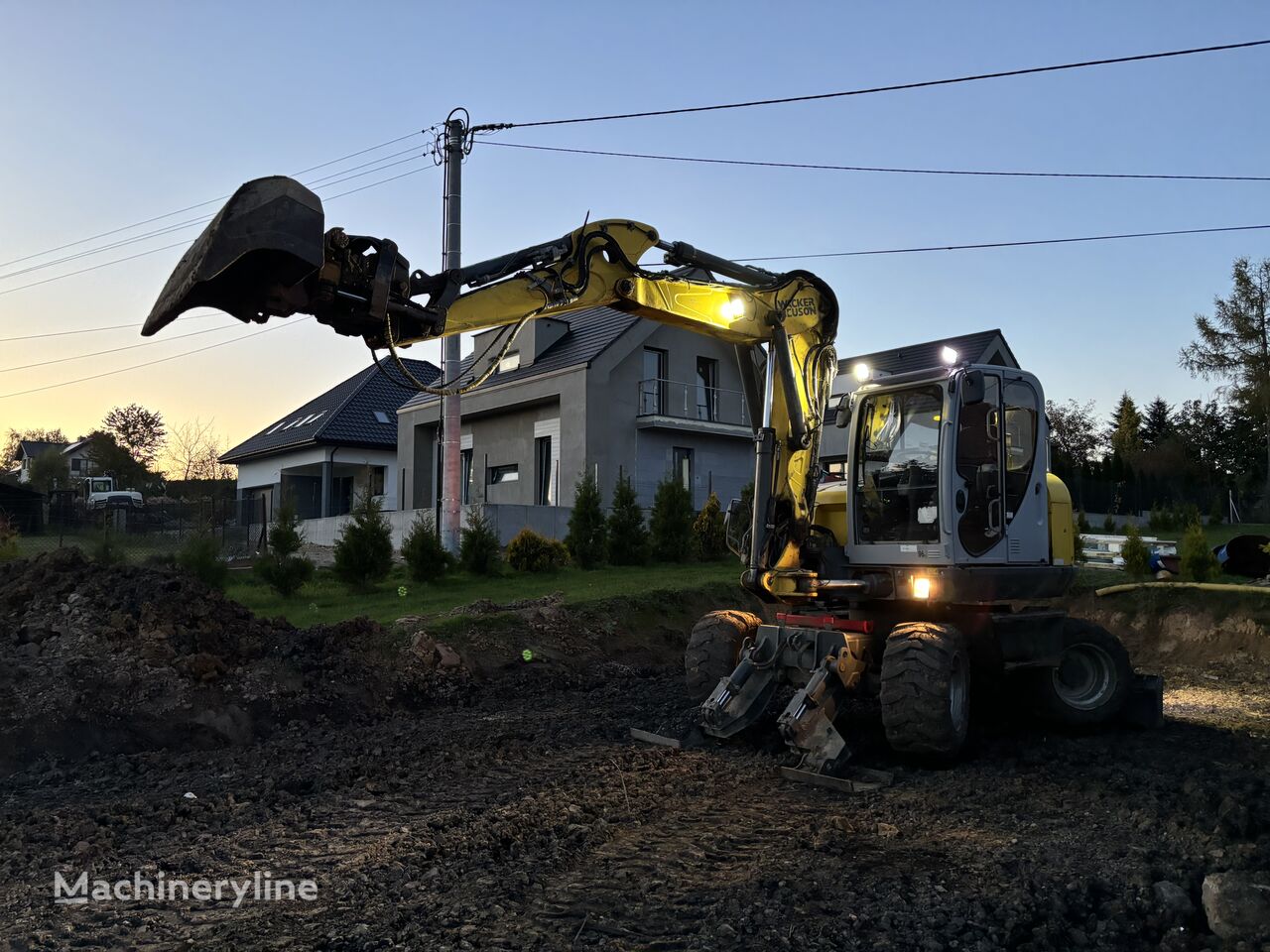 Wacker Neuson EW100 gumikerekes kotró