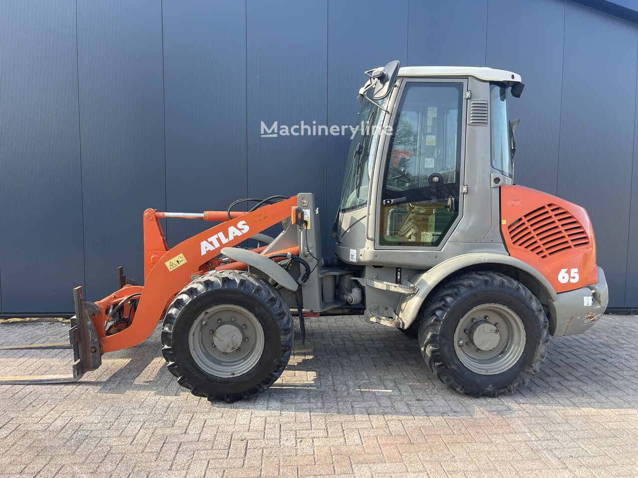 Купить фронтальный погрузчик Atlas Ar65 | Machineryline TJ Фронтальный погрузчик Atlas Ar65 - Machineryline