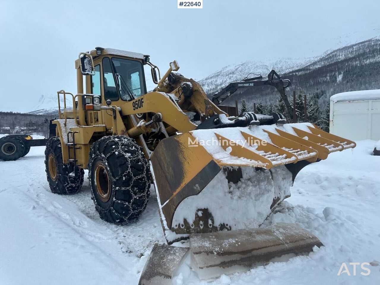 Caterpillar 950F wheel loader w/ 2 buckets and pallet forks - Machineryline