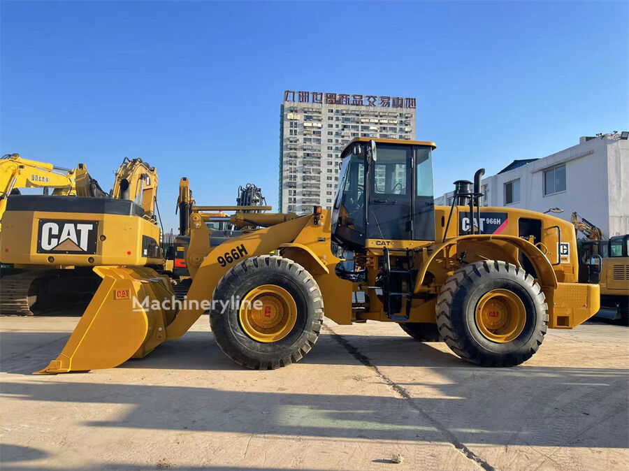 Челен товарач Caterpillar 966H - Machineryline