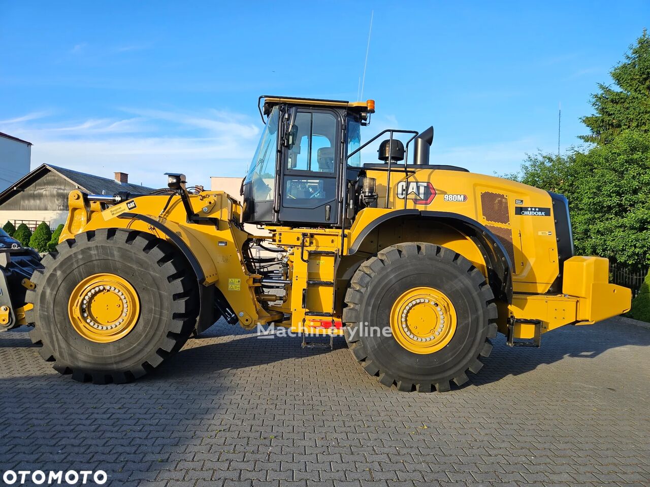 جرافة ذات عجلات Caterpillar 980M - Machineryline