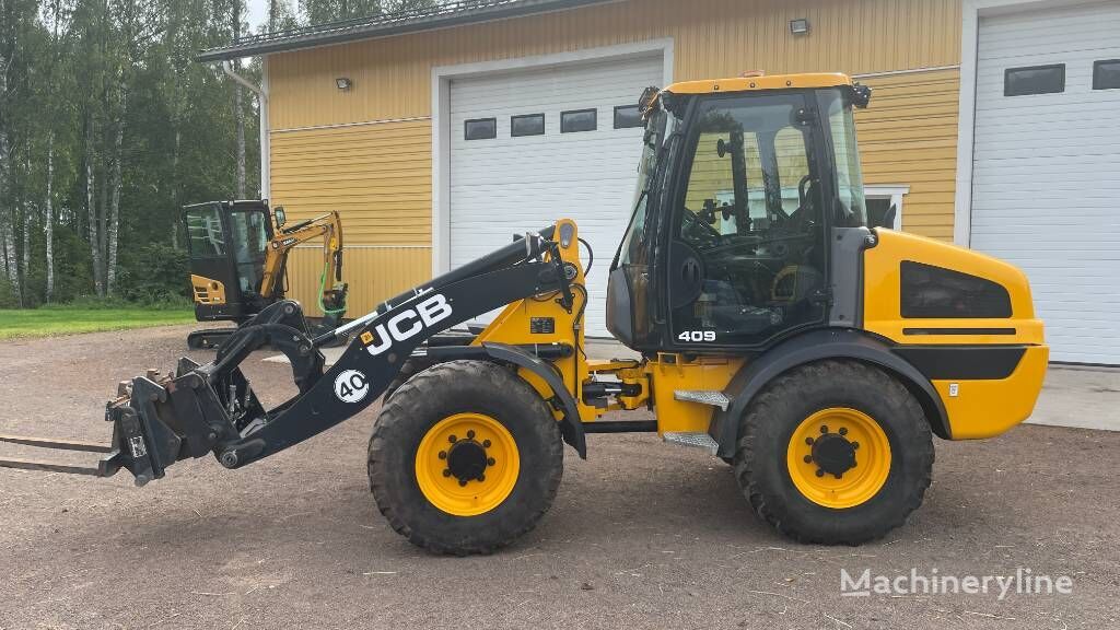 фронтальный погрузчик JCB 409 T4