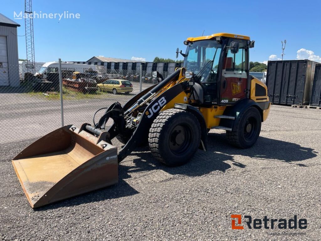 фронтальный погрузчик JCB 409 T4