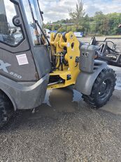 kolesov&yacute; nakladač Mecalac AX850