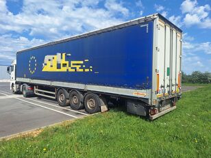 Fruehauf poluprikolica sa kliznim ceradom