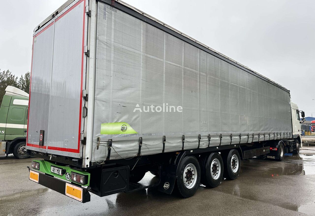 Kögel silver green curtain side semi-trailer