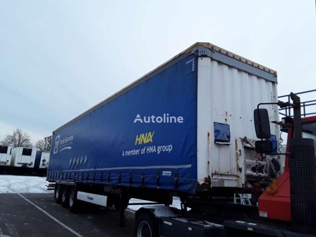 Krone Curtainsider Trailer aizkaru tipa puspiekabe