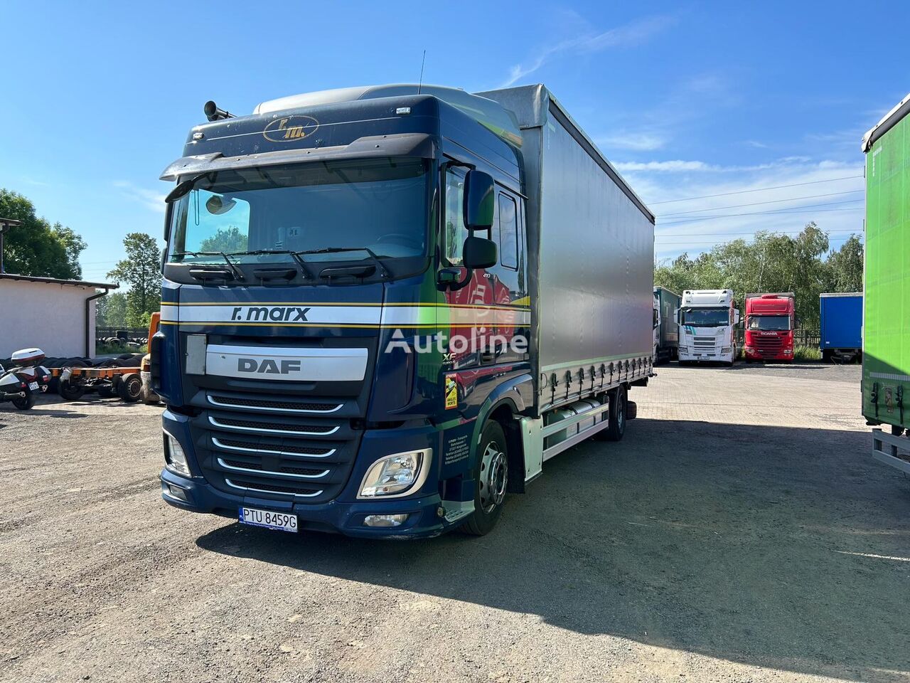 شاحنة ذات أغطية جانبية DAF XF410