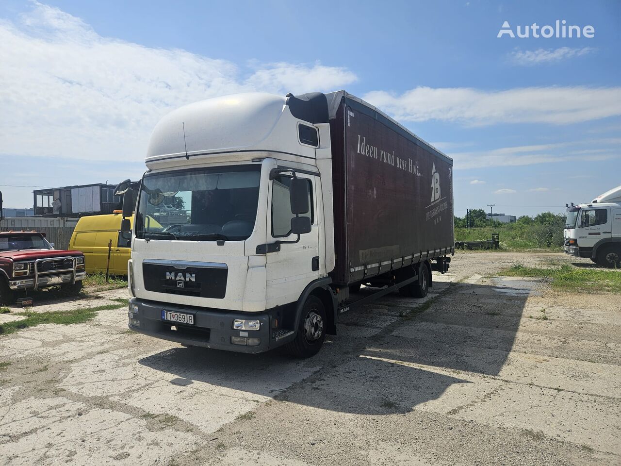 MAN TGL 12.180  curtainsider truck