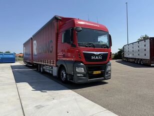 грузовик штора MAN TGX 24.400 MAN TGX TGX 24.400 6X2 Komplett mit Anhanger 115m3