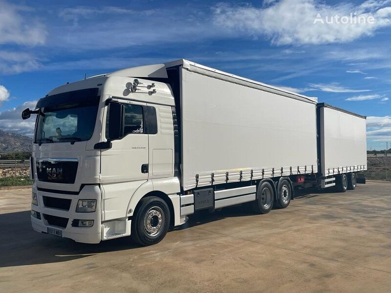 camião com lona deslizante MAN TGX 26.440 + reboque com cortina lateral