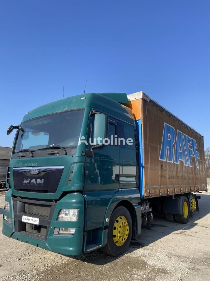 MAN TGX 26.440 curtainsider truck