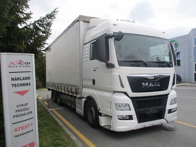 MAN TGX 26.440 6x2 curtainsider truck