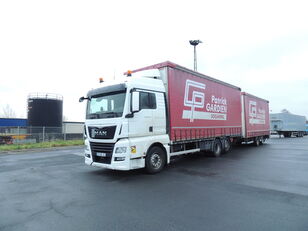 ciężarówka firanka MAN TGX 26.440 6x2 Tautliner + Fruehauf anhanger (Retarder) + przyczepa firanka