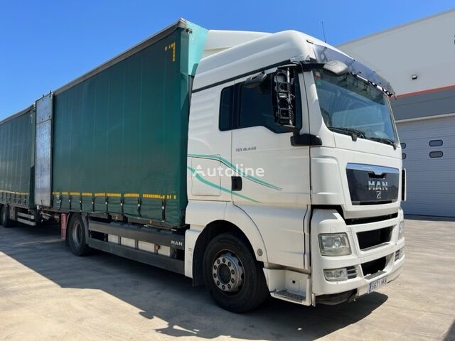 грузовик штора MAN TGX18.440-XLX TAULINER-EURO 5