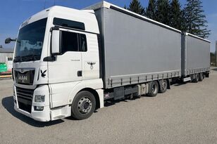 MAN tgx 24.510 cami&oacute;n con lona corredera + remolque con lona corredera