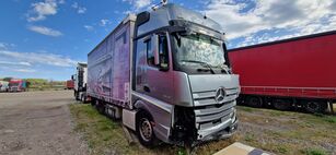 damaged Mercedes-Benz ACTROS 2545 curtainsider truck