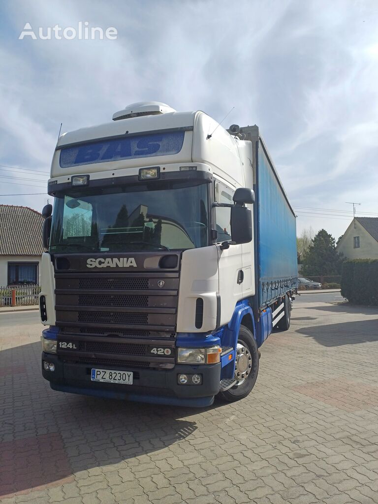 Scania L124 HPI curtainsider truck