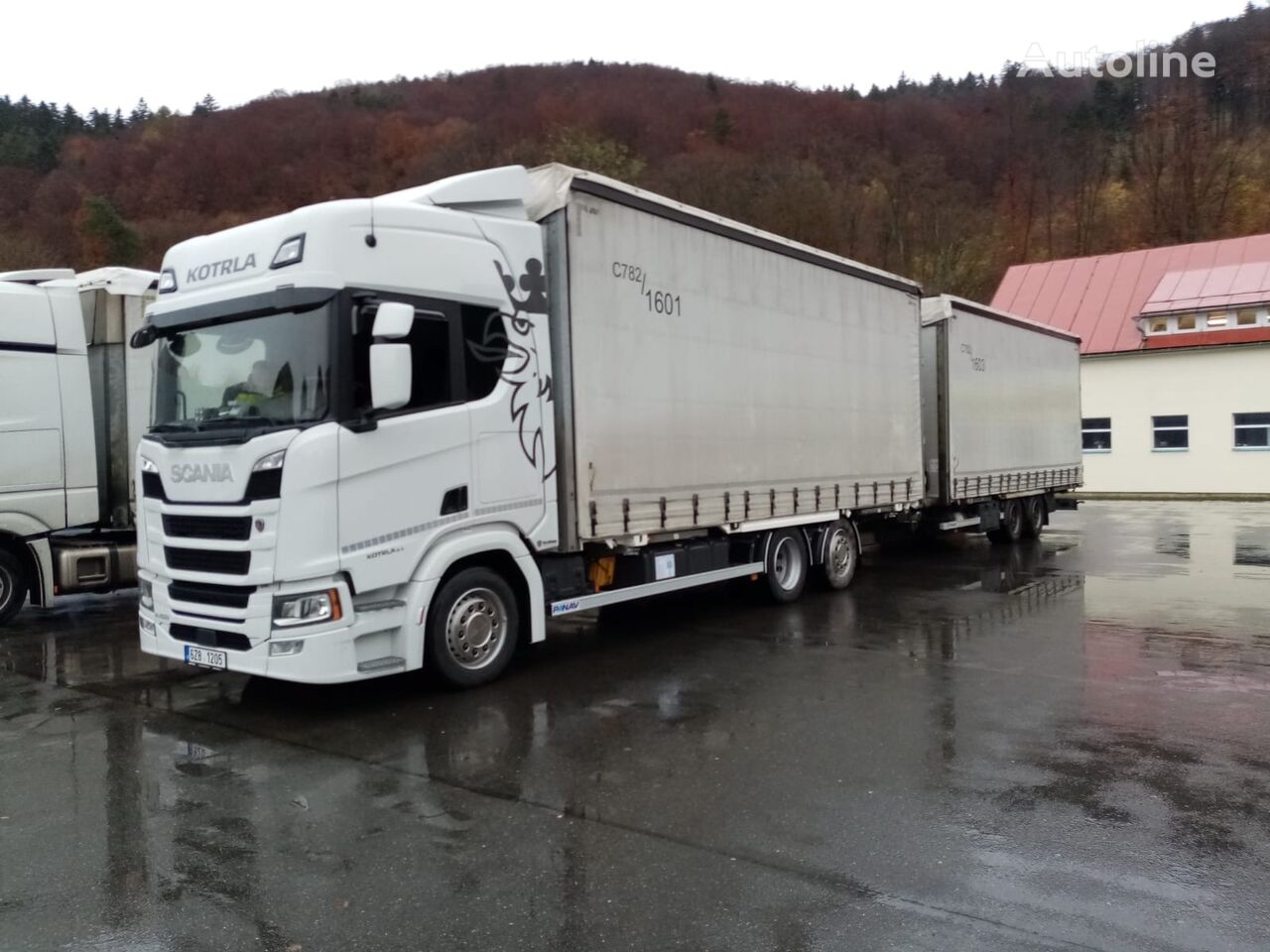 شاحنة ذات أغطية جانبية Scania R450 + مقطورة ستارة