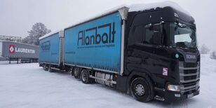 cami&atilde;o com lona deslizante Scania S450 + reboque com cortina lateral