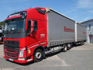 Volvo FH 460 kapellbil + gardintrailer