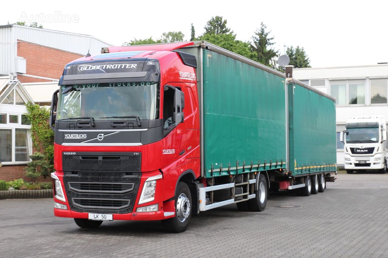 شاحنة ذات أغطية جانبية Volvo FH 460 Globetrotter + مقطورة ستارة