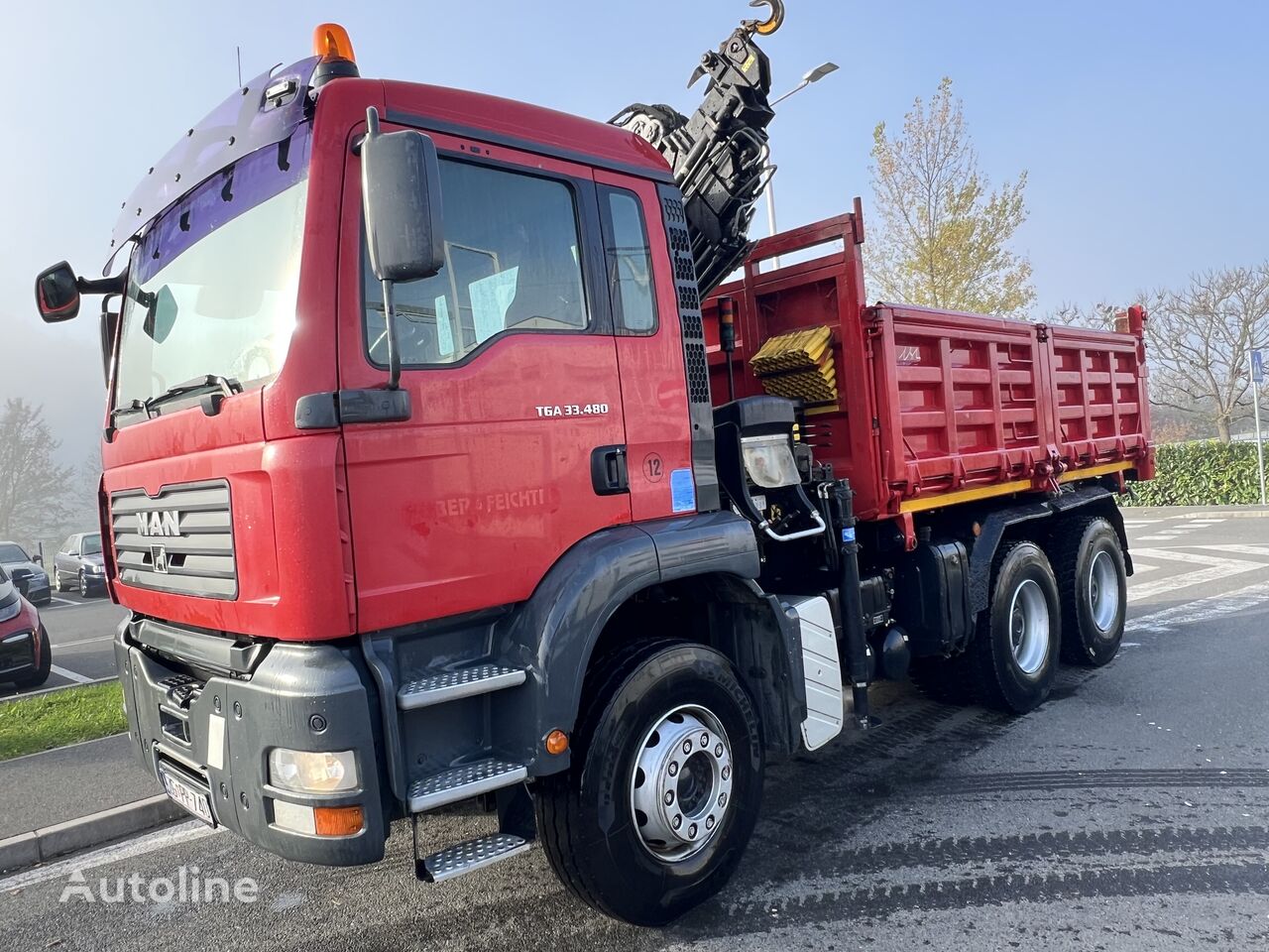 덤프 트럭 MAN 33.480 Kipper kran Hiab 166