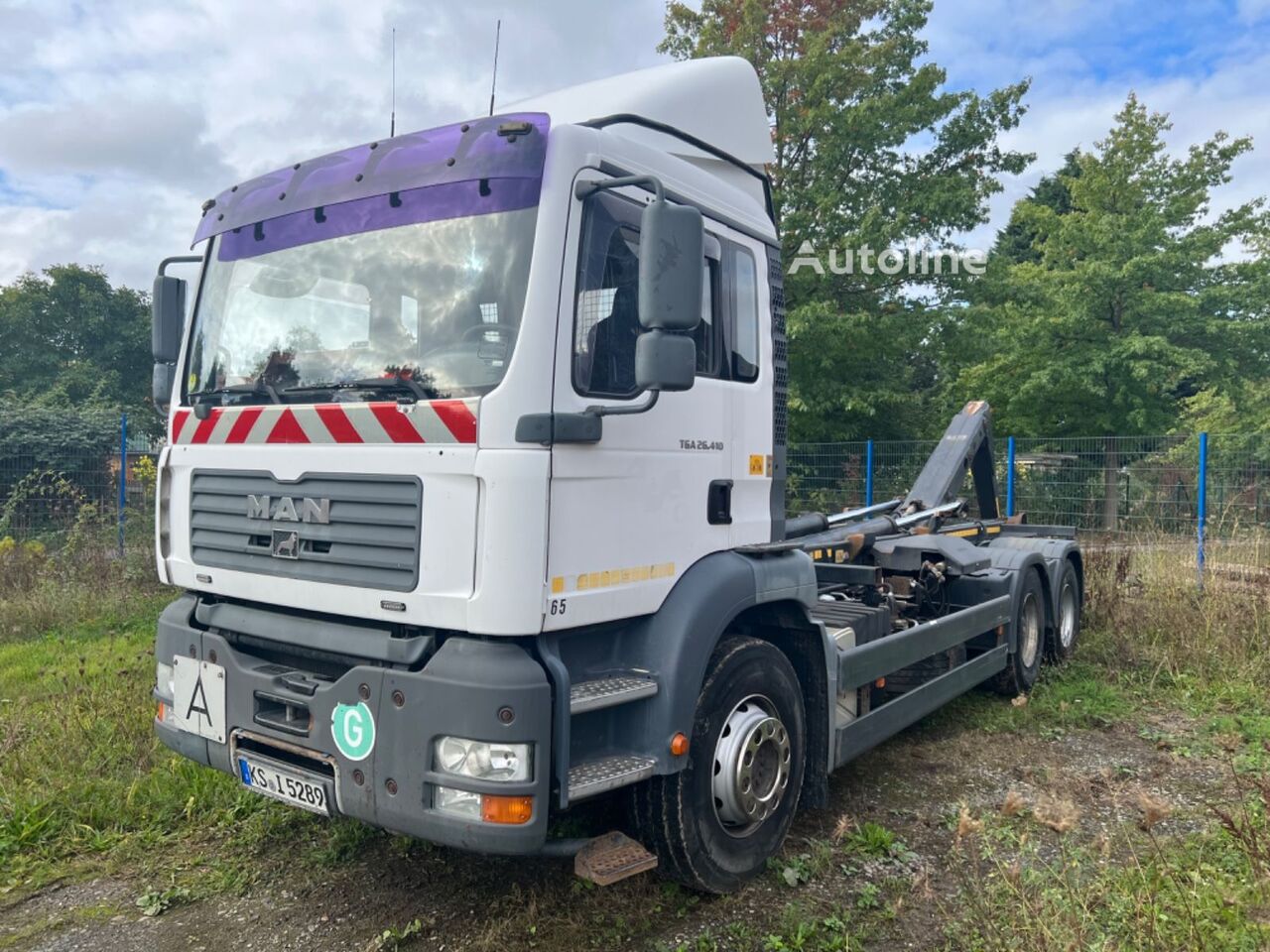 MAN TGA 26.410, 6x4 Abrollkipper Meiller Blattfedern dump truck - Autoline