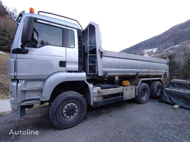 самосвал MAN TGS 33.480 6X6 MACHINE SUISSE