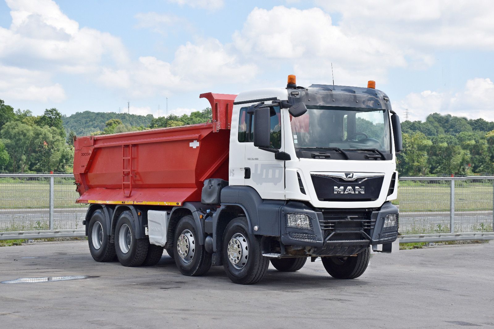 самосвал MAN TGS 35.460