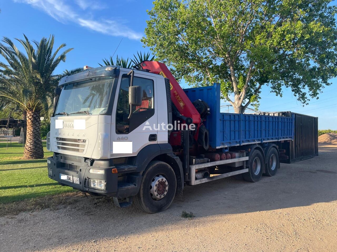 IVECO Trakker 410 flatbed truck