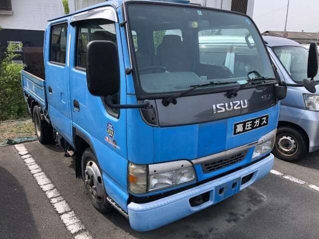 Isuzu ELF flatbed truck