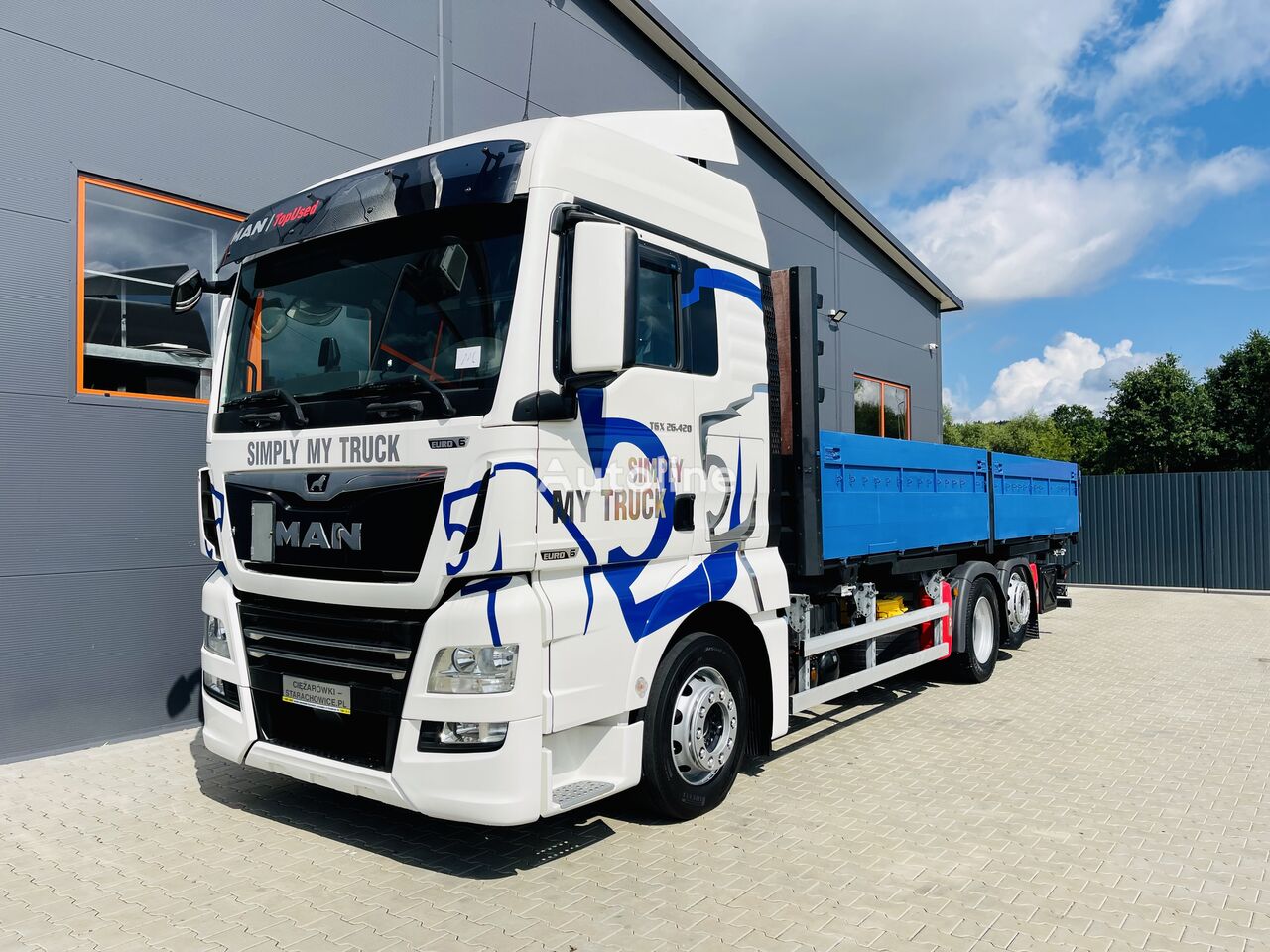 MAN TGX 24.420 flatbed truck