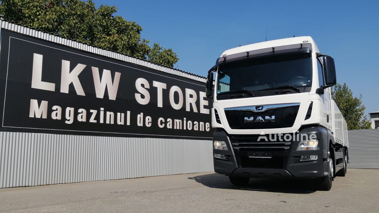 MAN TGX 26.460 flatbed truck