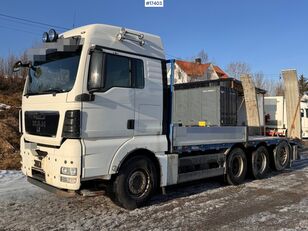 ciężarówka burtowa MAN TGX 35.480 8x4 flatbed truck w/ driving bridges
