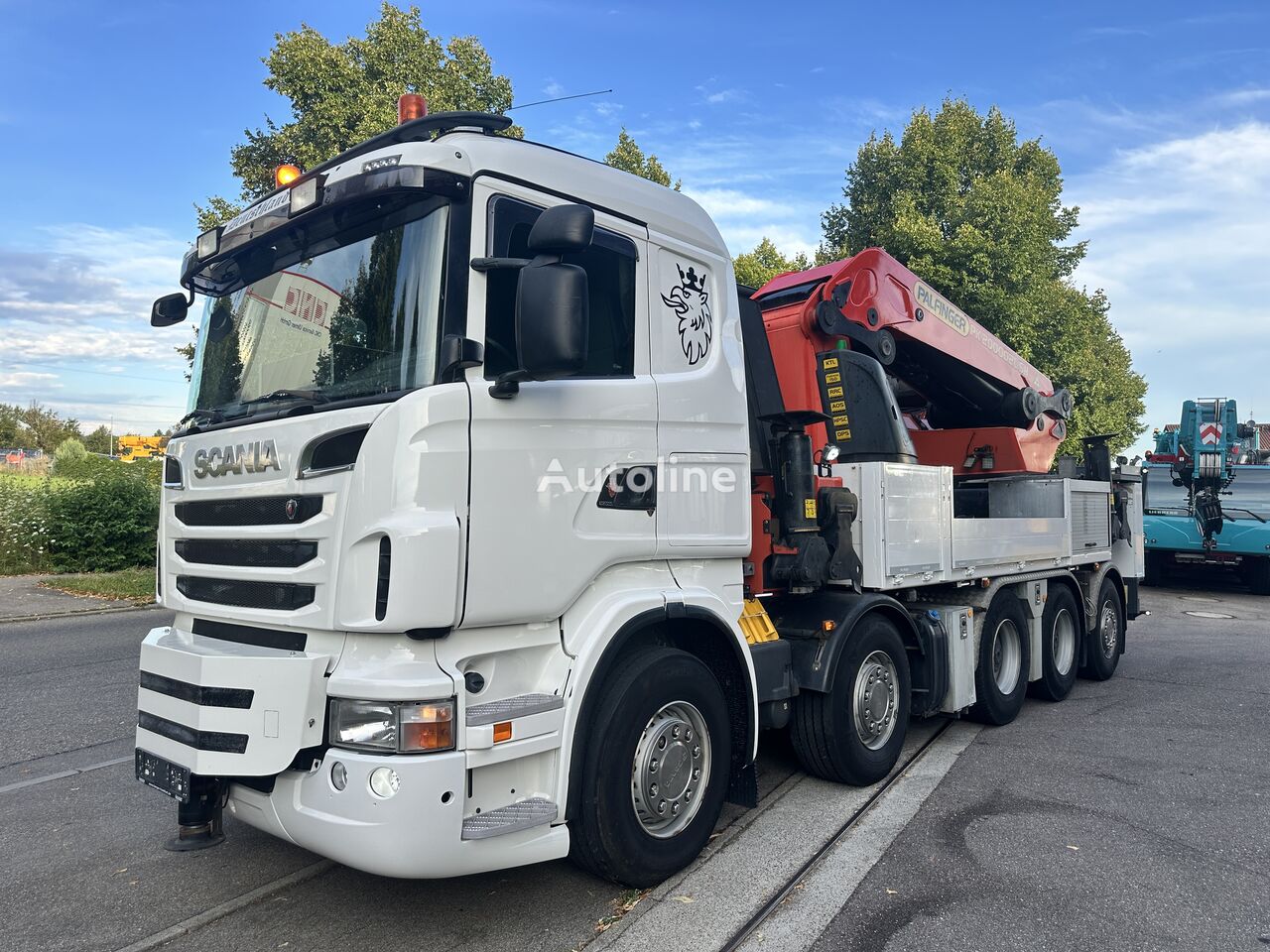 Scania R 560 LB flatbed truck