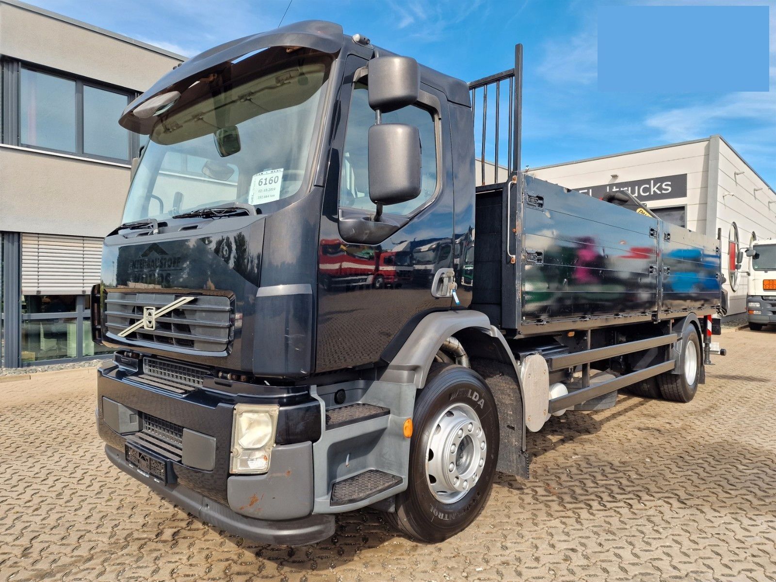 Volvo FE 260 camión caja abierta