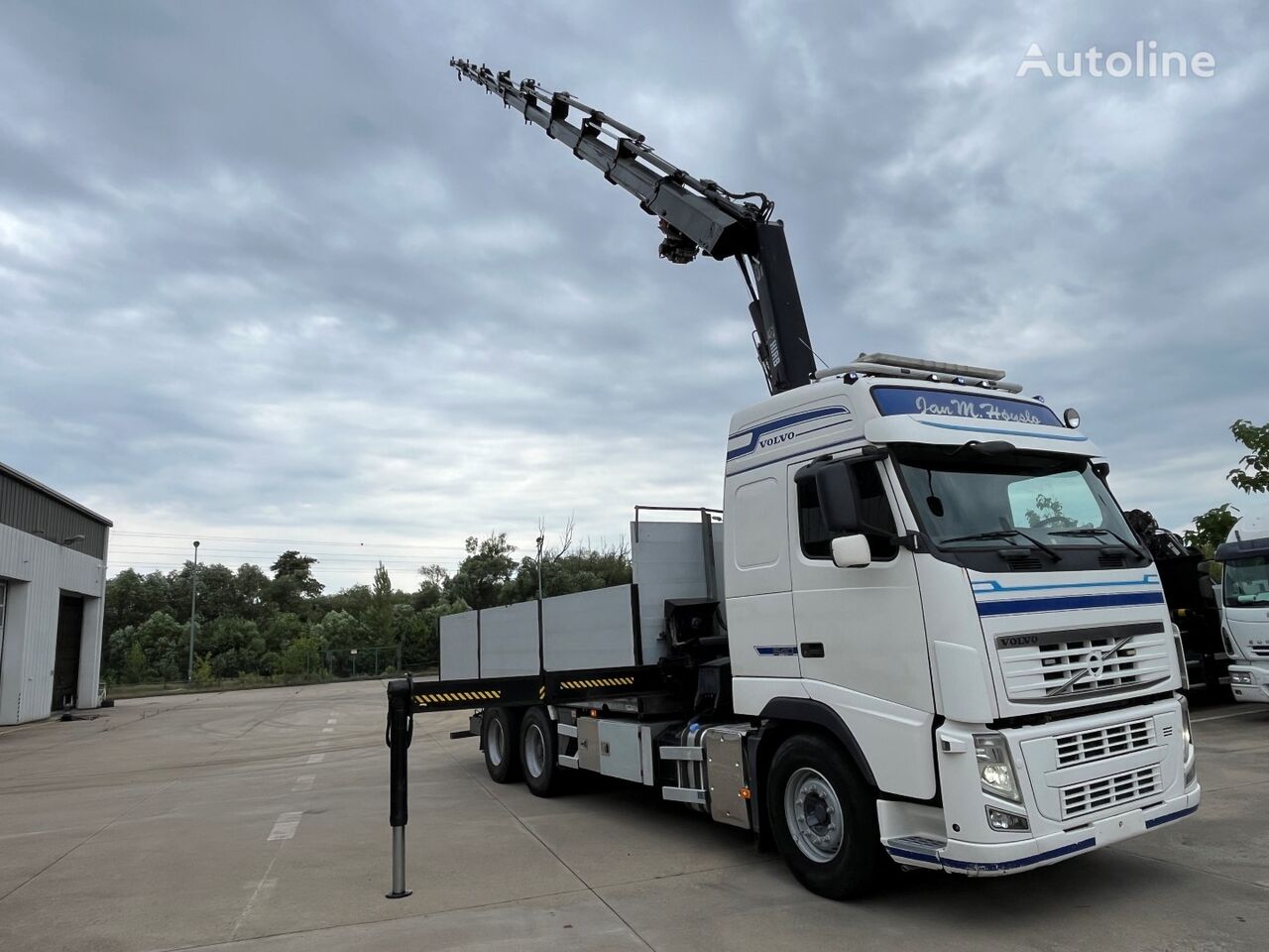 Volvo FH 540 flatbed truck