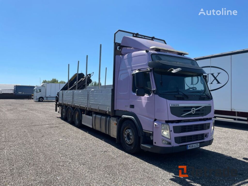 Volvo FM8x4 flatbed truck