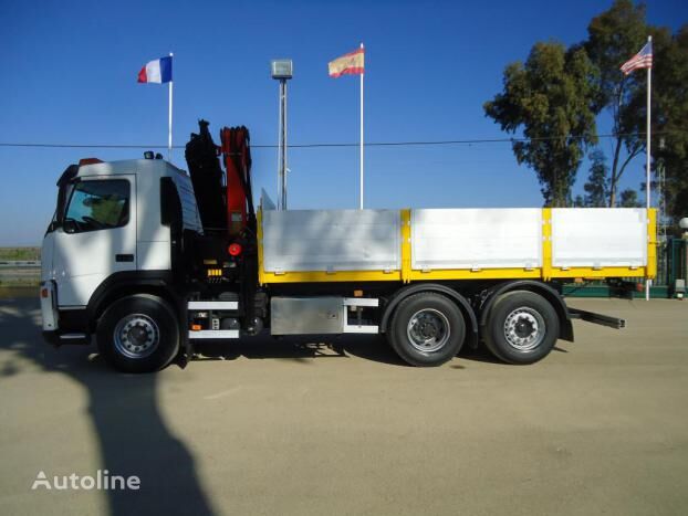 Volvo FM9 300 flatbed truck