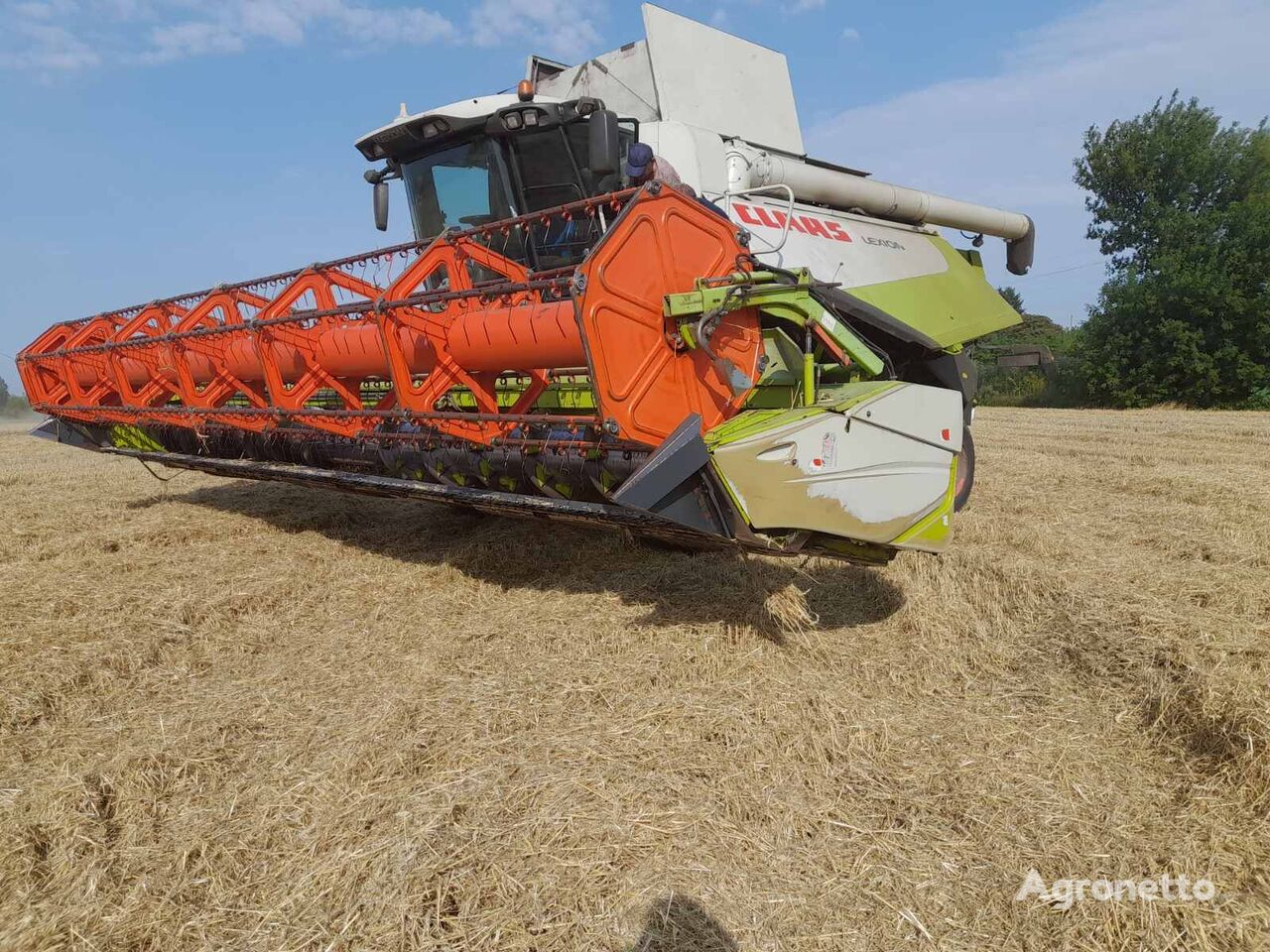 moissonneuse-batteuse Claas Lexion 580