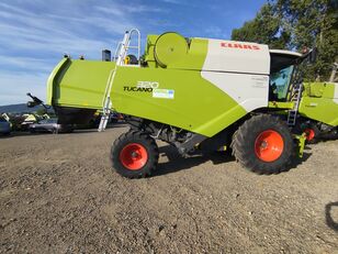 Claas Tucano 320 + heder grain harvester