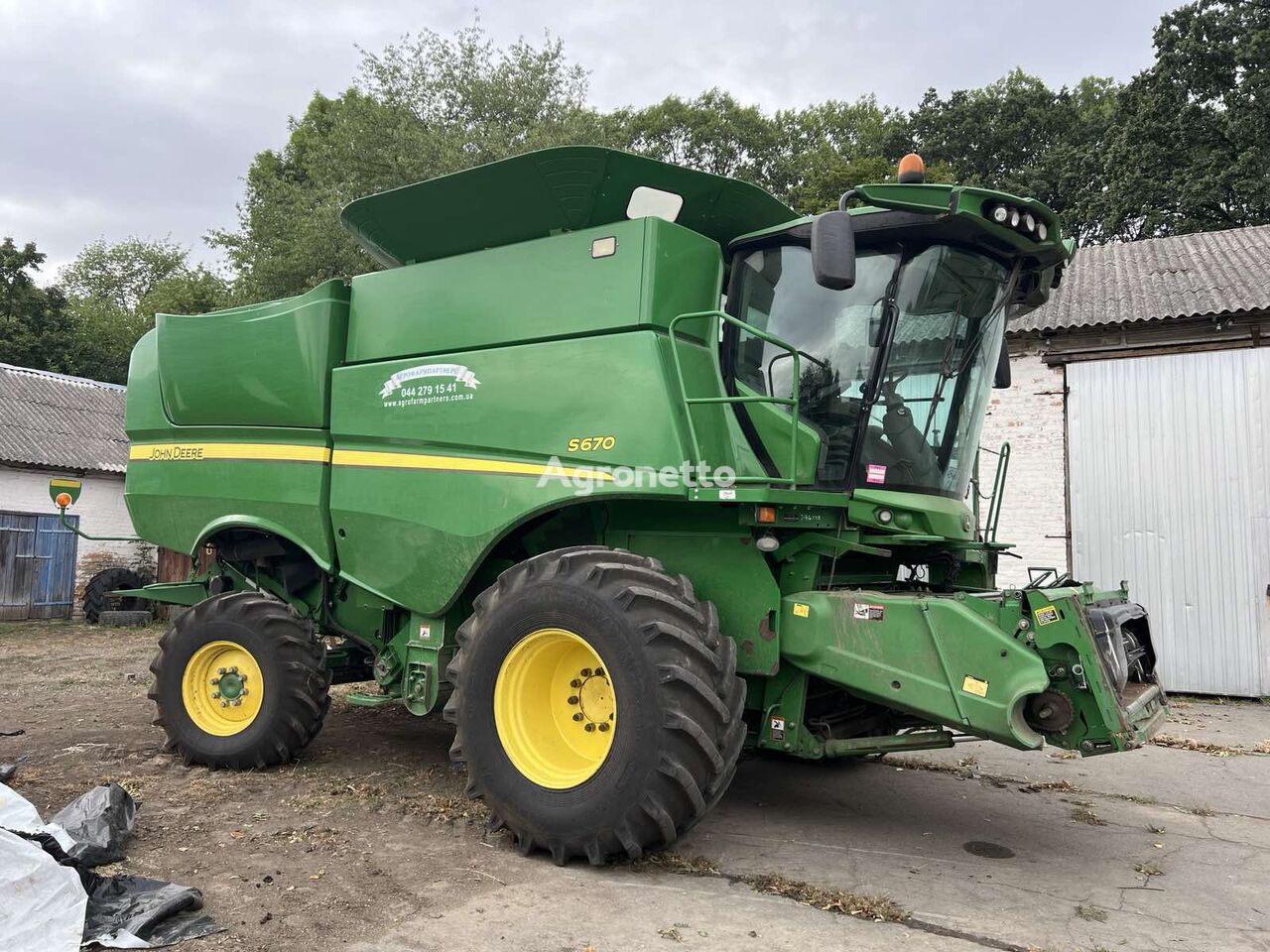 John Deere S 670 v Lizynh  kombajn za žito