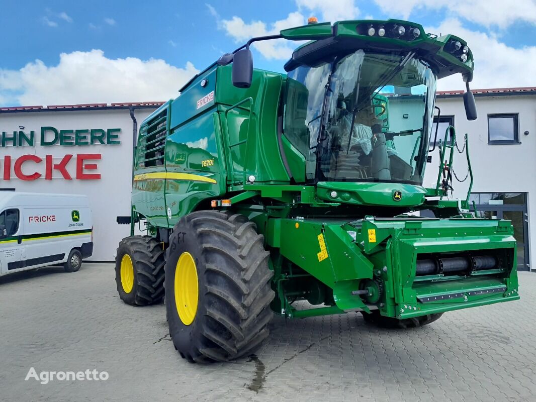 new John Deere T6 700 grain harvester