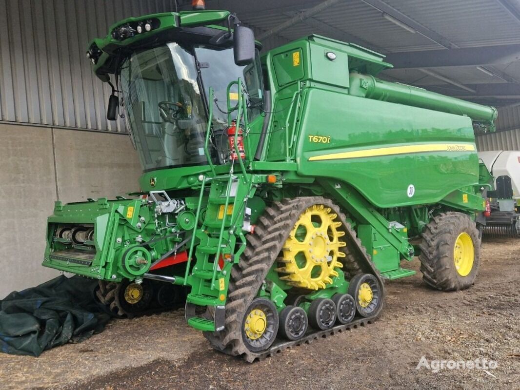 John Deere T670 Raupe mit 730FD cosechadora de cereales