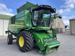 John Deere W550 grain harvester