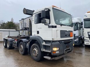 MAN 32.364 hook lift truck