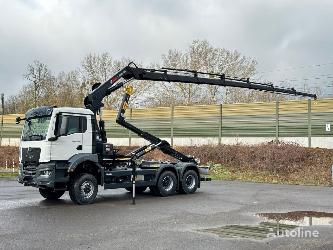 new MAN TGS 33.440 6x6 BB Abrollkipper+Kran Hiab 228-6 hook lift truck