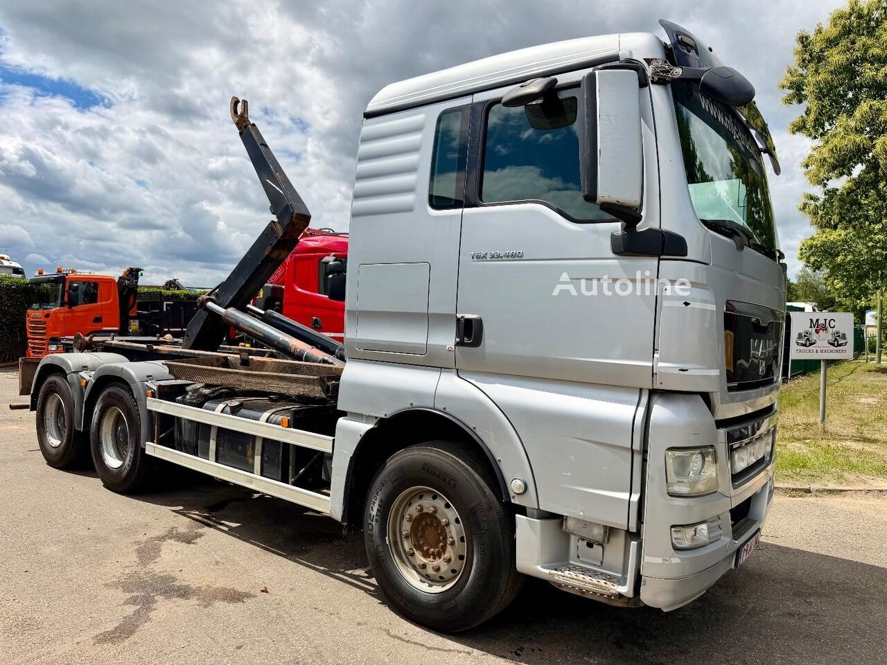 MAN TGX 33.480 6x4 MANUAL ZF - AJK HOOKLIFT - AIR SUSPENSION / HUB R hook lift truck - Autoline