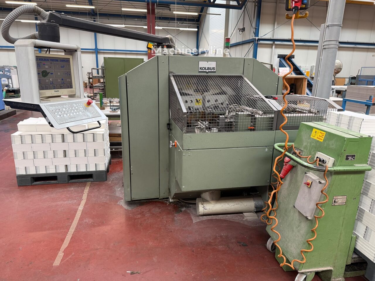 Stroj na řezání papíru Kolbus HD 140.P - Machineryline